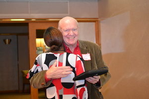 Man hugging woman