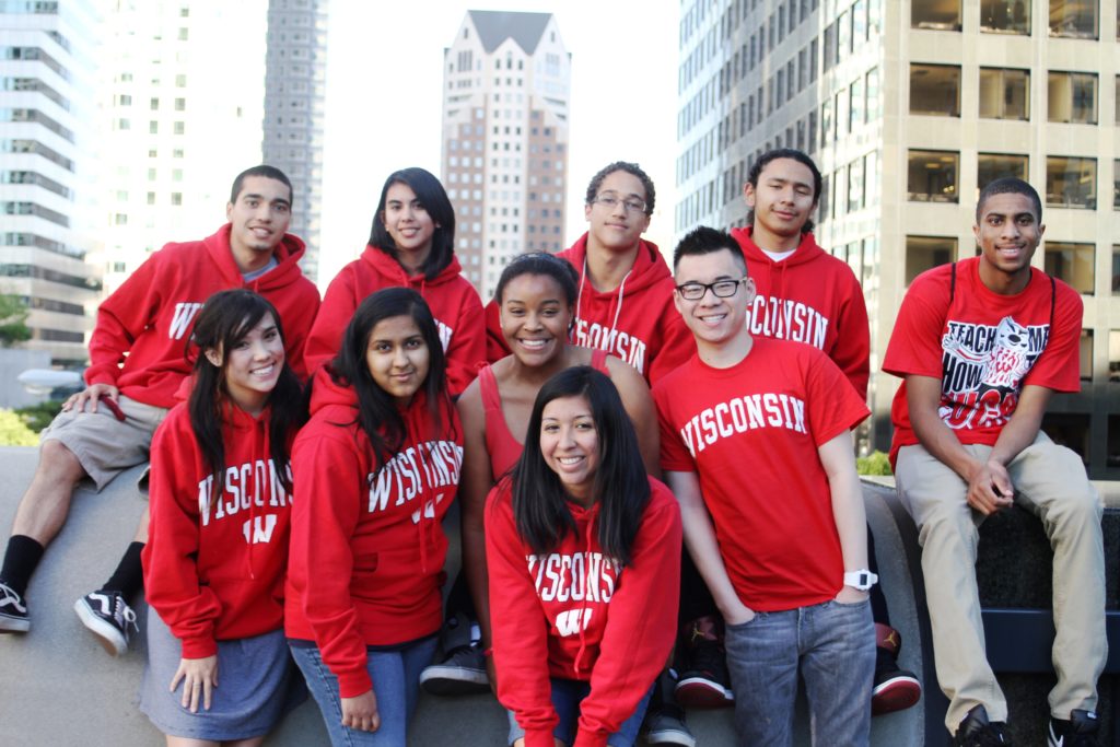 A group of LA Posse scholars pose in matching red Wisconsin shirts.